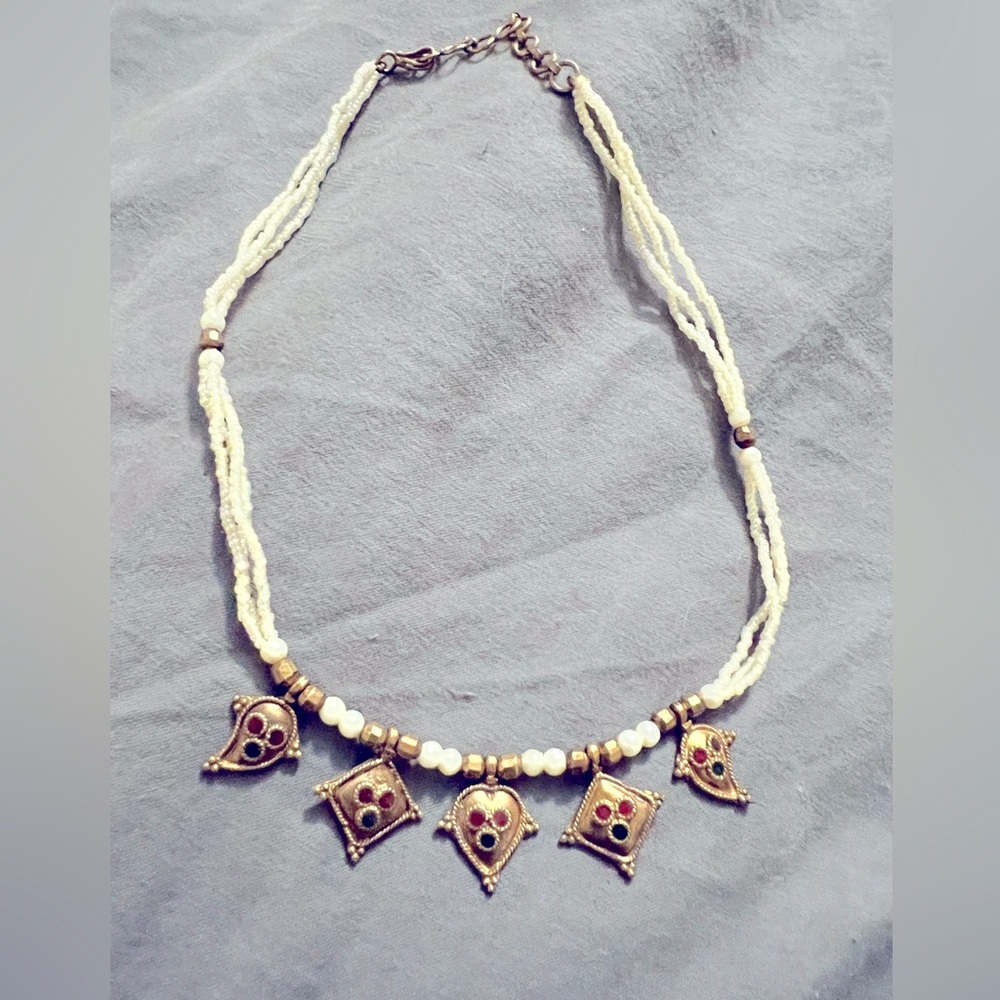 Middle eastern inspired choker with jewel and brass accents.